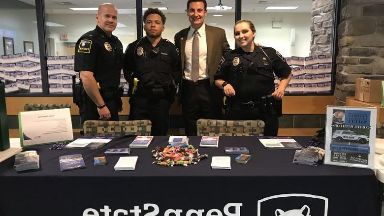 Officers at Coffee with a Cop event for employees.